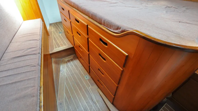 Slide: The Image of 1987 Wittholtz/Luzier 49 | Destiny Wooden interior of 1987 Custom Wittholtz/Luzier Sloop/Cutter with built-in drawers and seating. - 6319024