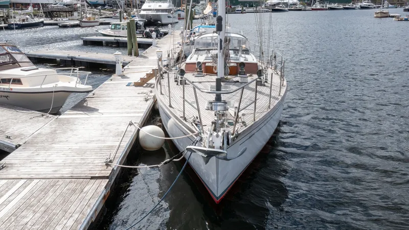 Slide: The Image of 1987 Wittholtz/Luzier 49 | Destiny Custom 1987 Wittholtz/Luzier Sloop/Cutter docked at marina, showcasing sleek design and craftsmanship. - 6318981