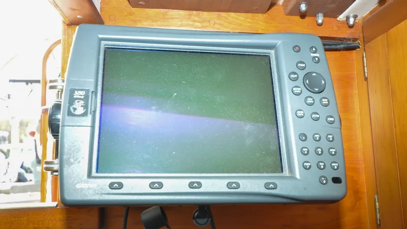 Slide: The Image of 1987 Wittholtz/Luzier 49 | Destiny Navigation system on 1987 Custom Wittholtz/Luzier Sloop/Cutter yacht, featuring control buttons. - 6319040