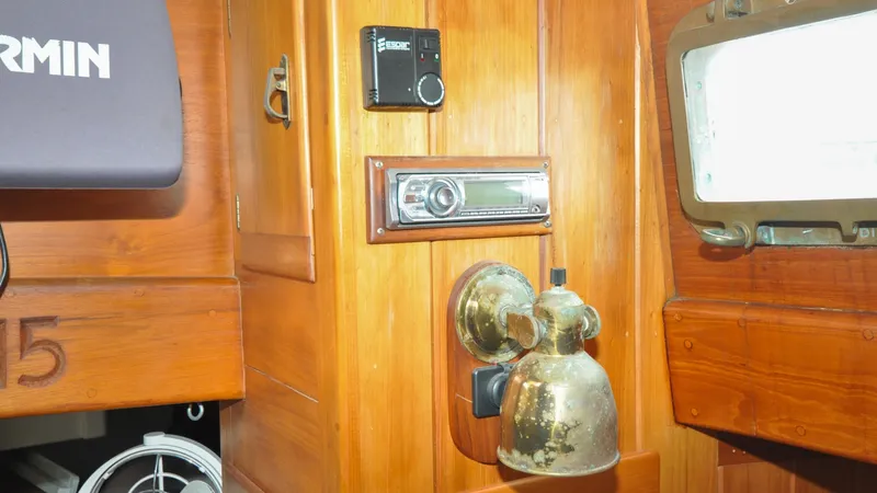 Slide: The Image of 1987 Wittholtz/Luzier 49 | Destiny Interior of 1987 Custom Wittholtz/Luzier Sloop/Cutter with vintage brass lamp and wooden paneling. - 6319041