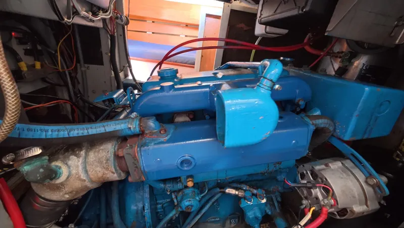 Slide: The Image of 1987 Wittholtz/Luzier 49 | Destiny Engine of 1987 Custom Wittholtz/Luzier Sloop/Cutter, featuring blue components and wiring. - 6323966