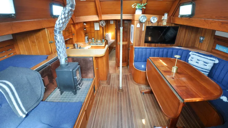 Slide: The Image of 1987 Wittholtz/Luzier 49 | Destiny Interior of 1987 Custom Wittholtz/Luzier Sloop/Cutter with wood finish and cozy seating area. - 6319049
