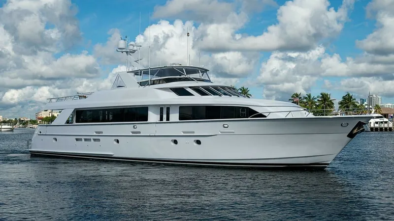 Slide: The Image of Starboard Profile of Raised Pilothouse This image showcases the elegant starboard profile of the 2003 Hatteras Raised Pilothouse. The vessel's sleek lines and expansive windows emphasize its luxurious design and spacious interiors. The Magnum Ride's sophisticated structure is complemented by a - 6388466