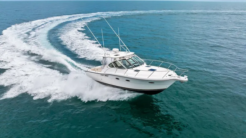 Slide: The Image of Tiara 32 Open Cruising The 2007 Tiara 32 Open 'Second Chance' is captured cruising through open waters with elegance. Its sleek design and robust hull effortlessly cut through the waves, showcasing the vessel's power and agility. The spacious deck and well-crafted lines highlig - 6394615