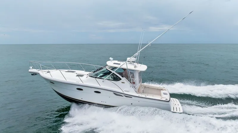 Slide: The Image of Tiara 32 Open Cruising Profile This image showcases the Tiara 32 Open 'Second Chance' gliding effortlessly through the water. The sleek hull design and spacious cockpit are highlighted, offering both style and functionality for avid seafarers. The powerful twin engines ensure a smooth - 6394622