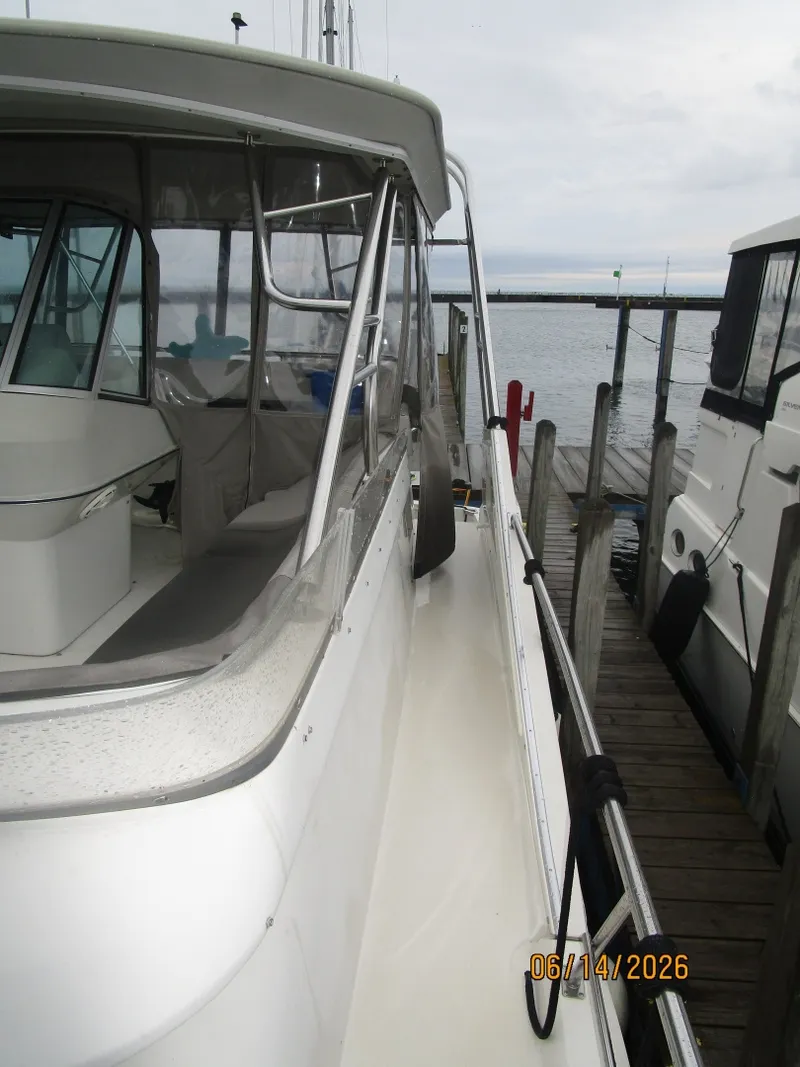 Slide: The Image of 42' Cruisers port side deck - 6419324