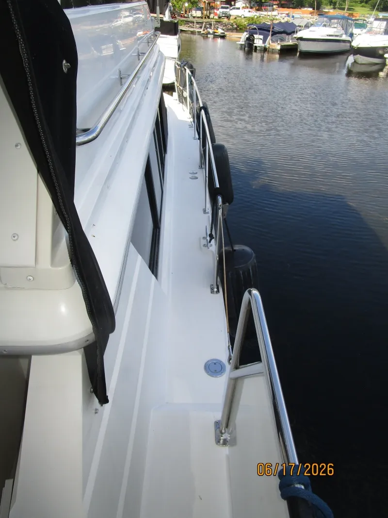 Slide: The Image of 43' Carver starboard side deck2 - 6422935