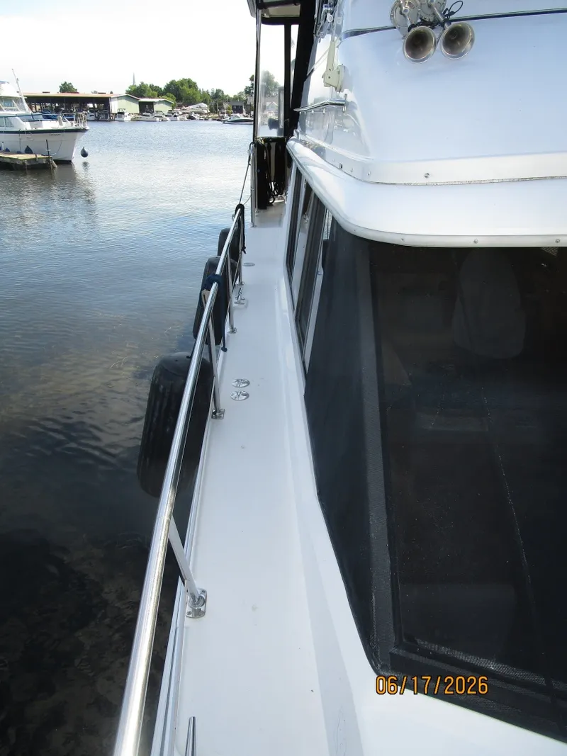 Slide: The Image of 43' Carver starboard side deck1 - 6422936