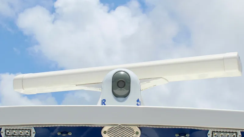 Slide: The Image of Radar and Camera System The image showcases the advanced radar and camera system on the 2020 Blackfin 332 Center Console. This cutting-edge technology ensures enhanced navigation and safety, providing clear visibility in various weather conditions. The streamlined design integra - 6687445