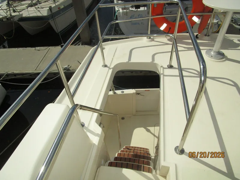 Slide: The Image of 40' Mainship flybridge-aftdeck stairs - 6520477
