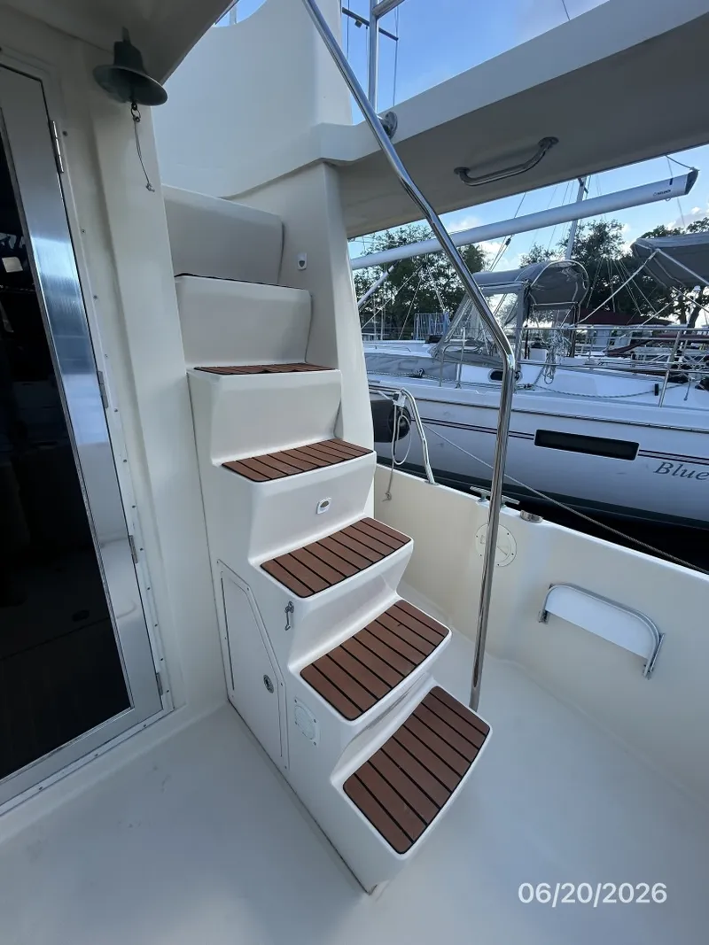 Slide: The Image of 40' Mainship aftdeck-flybridge stairs - 6519827