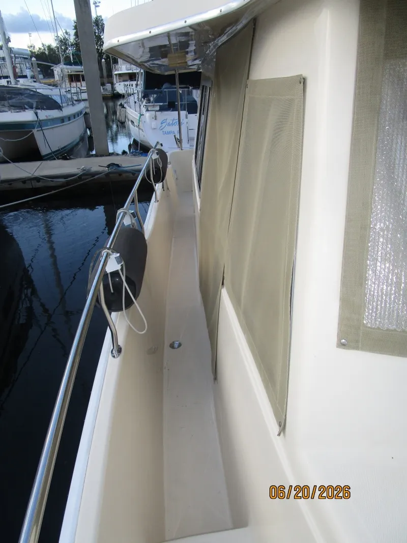 Slide: The Image of 40' Mainship starboard side deck2 - 6519956