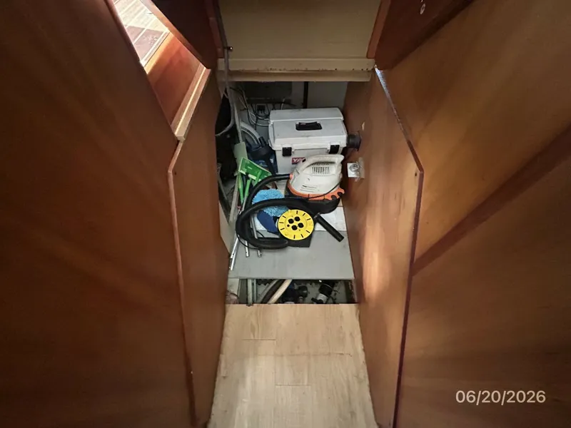 Slide: The Image of 40' Mainship companionway storage - 6519898