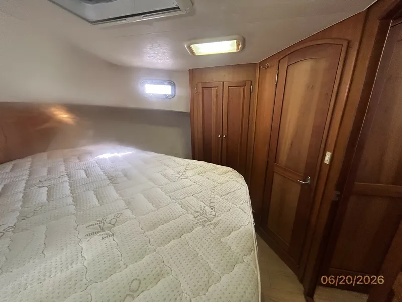 Slide: The Image of 40' Mainship master stateroom starboard - 6519941