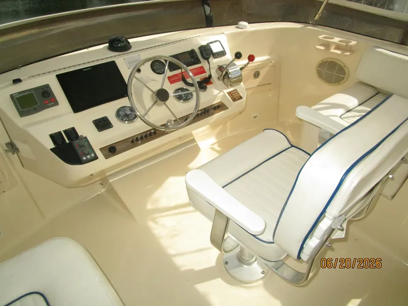 Slide: The Image of 40' Mainship flybridge helm1 - 6519858