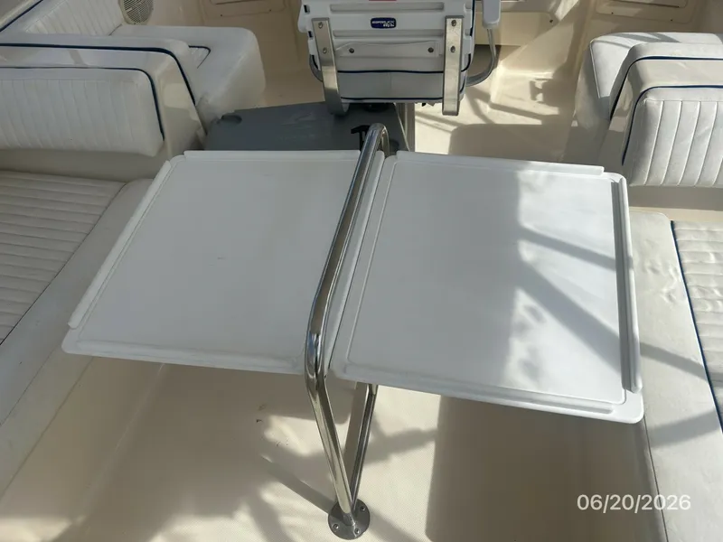 Slide: The Image of 40' Mainship flybridge table - 6519886