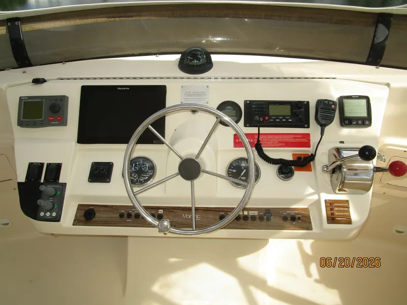 Slide: The Image of 40' Mainship flybridge helm3 - 6519865