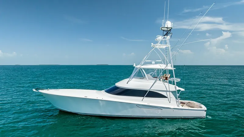 The Image of Profile of Viking 62 Convertible The sleek, powerful profile of the 2018 Viking 62 Convertible is beautifully captured from the starboard side. Its elegant lines and sturdy structure are complemented by a spacious flybridge with advanced navigation equipment. This vessel is designed for - 8440030