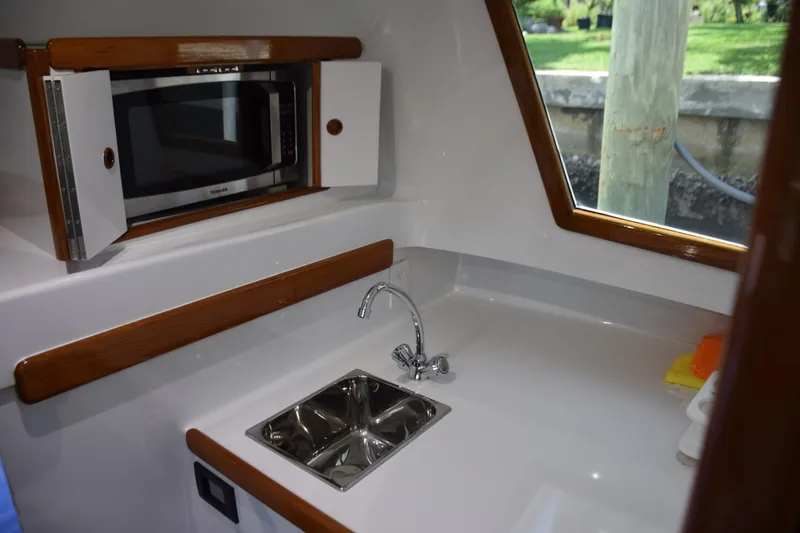 Slide: The Image of Microwave And Stainless Sink - 6551174