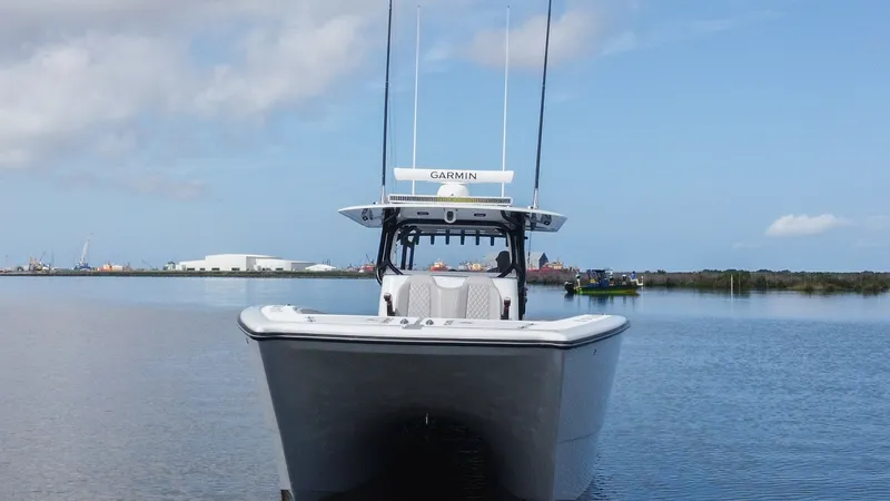 Slide: The Image of Bow View of Freeman 42 LR The Freeman 42 LR showcases a sleek and modern bow design, emphasizing its stability and cutting-edge performance. The vessel's wide stance and elegant lines are complemented by advanced navigation equipment, perfect for the avid seafarer. This view highl - 6725128