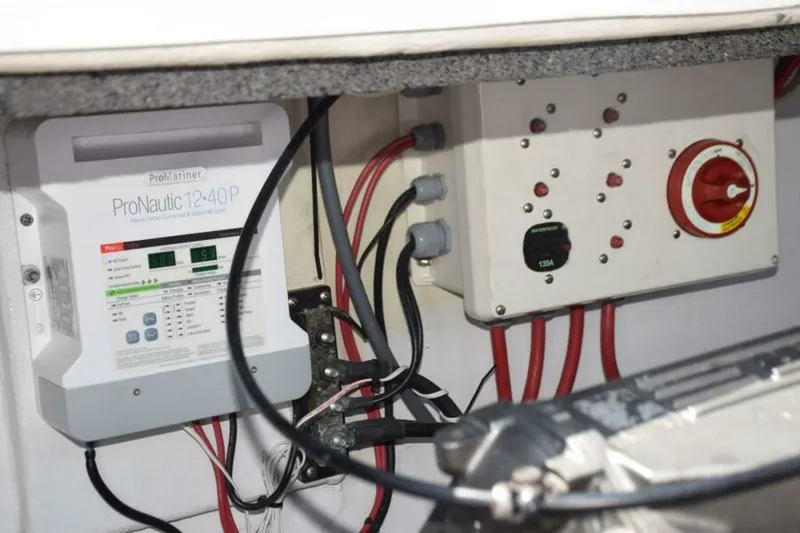 Slide: The Image of Outboard Port Motor, Smart Charger, Shut Off Switch, Circuit Breakers - 7384110