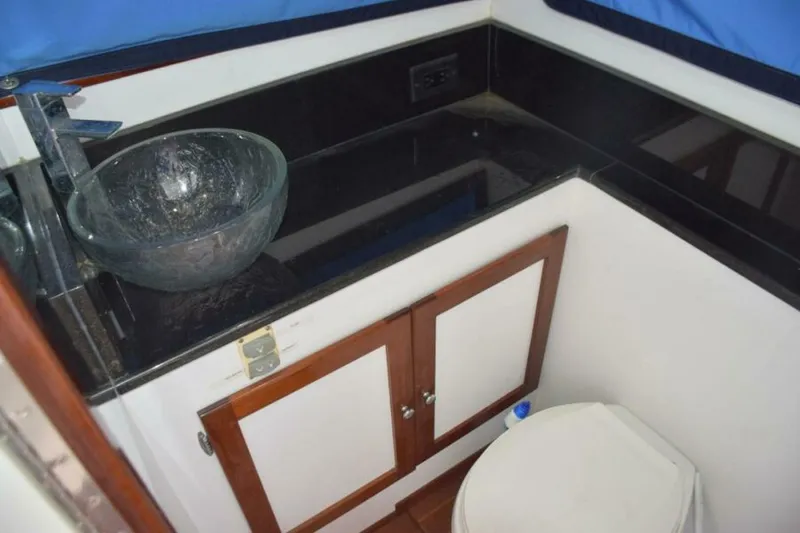 Slide: The Image of Head With Granite Vanity, Backsplash, And Basin Sink - 7384082