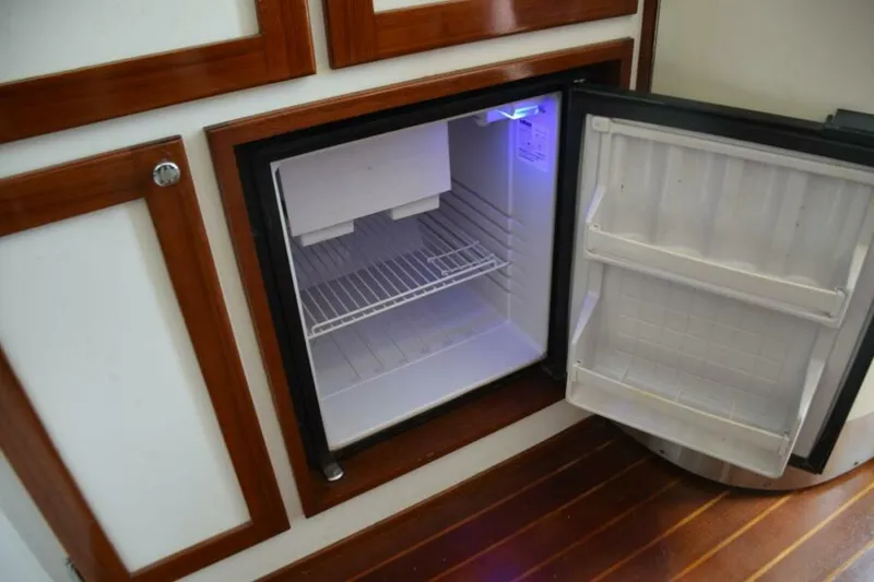 Slide: The Image of Refrigerator With Freezer Under Counter - 7384079