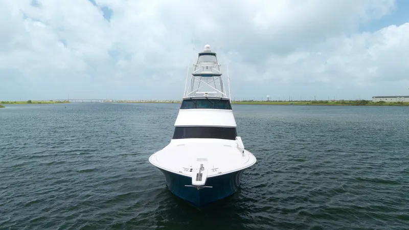 Slide: The Image of Bow View of Viking 65 Enclosed Bridge This striking bow view of the Viking 65 Enclosed Bridge showcases its sleek, aerodynamic design and robust build. The expansive foredeck is designed for smooth navigation, while the elegant lines of the hull highlight the vessel's craftsmanship. The enclo - 6767204