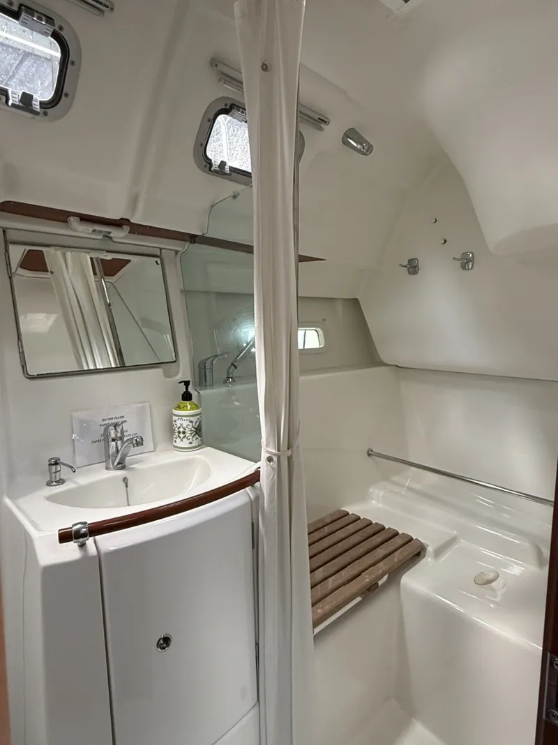 Slide: The Image of Large Bathroon Bathroom has a large separate shower with teak seat - 6807481