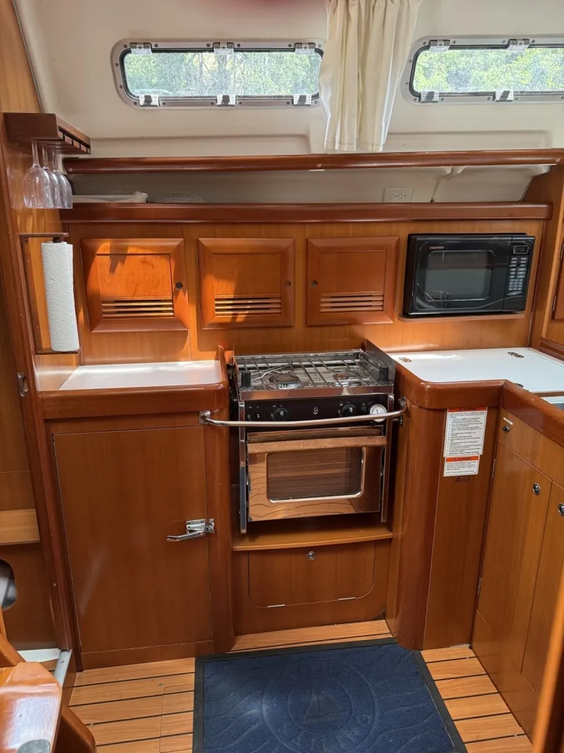 Slide: The Image of Complete Galley Upright fridge, Gimballed stove top burners and oven and microwave - 6808030