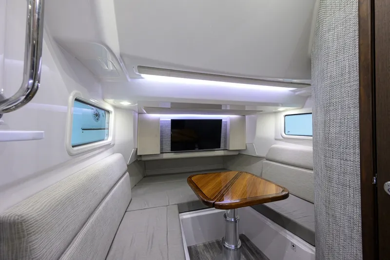 Slide: The Image of Everglades 45 GALLANT LADY - Cabin Seating & Table 2023 Everglades 455 Center Console GALLANT LADY - 7656327