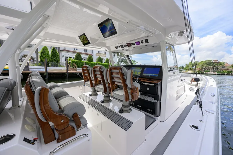 Slide: The Image of Everglades 45 GALLANT LADY - Starboard Side Helm Seating 2023 Everglades 455 Center Console GALLANT LADY - 7656338