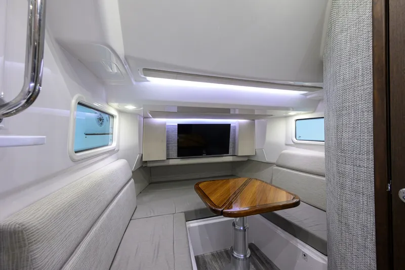 Slide: The Image of Everglades 45 GALLANT LADY - Cabin Seating & Table 2023 Everglades 455 Center Console GALLANT LADY - 6753026