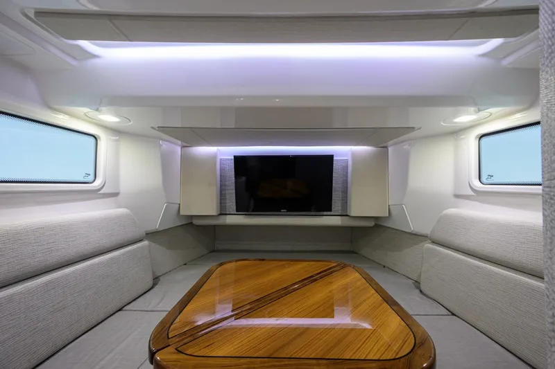 Slide: The Image of Everglades 45 GALLANT LADY - Cabin Seating & Table 2023 Everglades 455 Center Console GALLANT LADY - 7656328