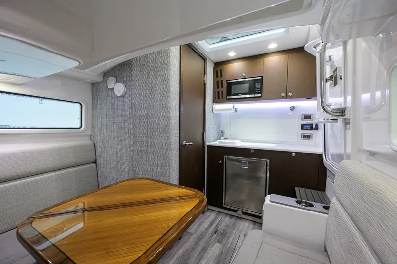 Slide: The Image of Everglades 45 GALLANT LADY - Cabin Table & Galley 2023 Everglades 455 Center Console GALLANT LADY - 7656329