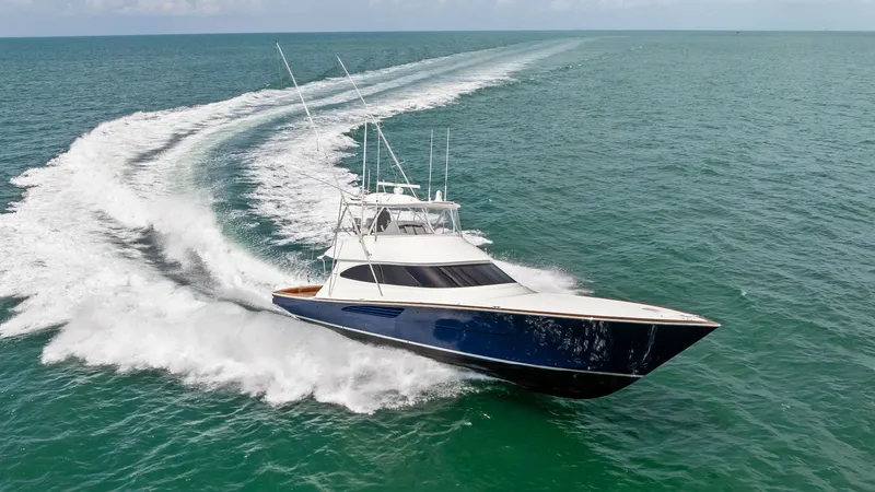 Slide: The Image of Dynamic Bow View on Open Water Experience the power and elegance of the 2024 Viking 64 Convertible as it gracefully cuts through the open sea. The sleek design and robust hull are perfectly showcased in this dynamic bow view, emphasizing its superior performance and stability. The vess - 7541899