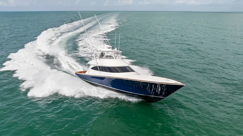 Slide: The Image of Dynamic Bow View in Motion The 2024 Viking 64 Convertible 'Southern Grace' showcases its sleek design and powerful performance as it gracefully cuts through the water. The dynamic bow view highlights the vessel's elegant lines and advanced hull engineering, ensuring both speed and - 7541898