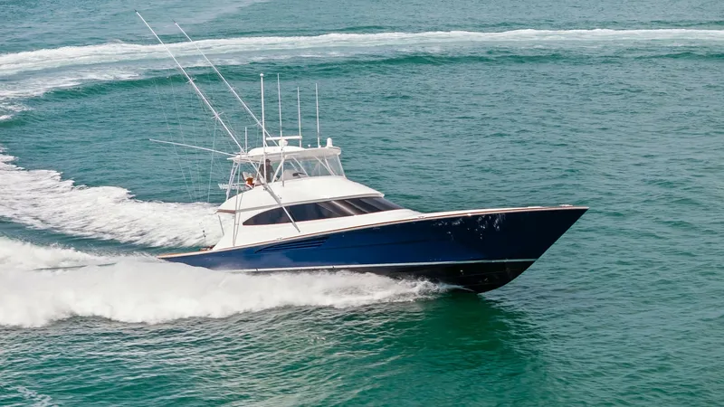 Slide: The Image of Viking 64 Convertible Cruising The 2024 Viking 64 Convertible, Southern Grace, showcases its powerful performance as it cruises through the water. The sleek hull design and robust construction highlight Viking's commitment to quality and seaworthiness. Equipped with state-of-the-art fi - 7541900