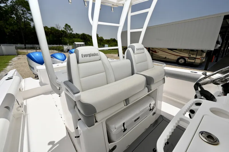 Slide: The Image of Everglades Helm Seats Twin bolstered helm chairs with slide-out Yeti cooler below. - 6788447