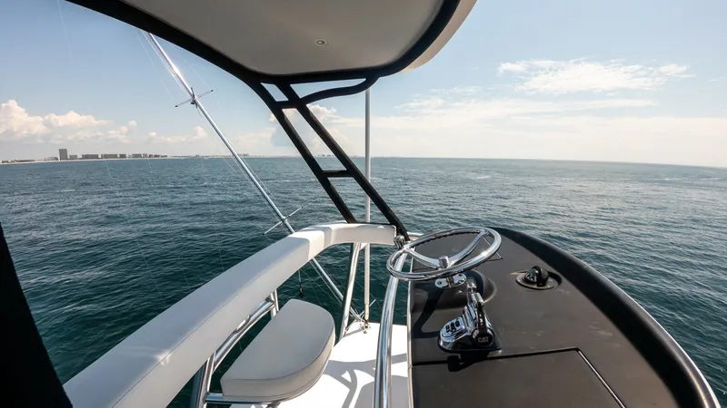 Slide: The Image of 2021 65 Hatteras GT On the DL Tower Helm (5) - 7403492