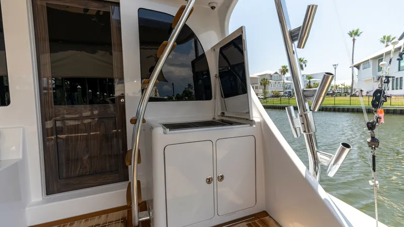 Slide: The Image of 2021 65 Hatteras GT On the DL Cockpit Grill (1) - 7403470