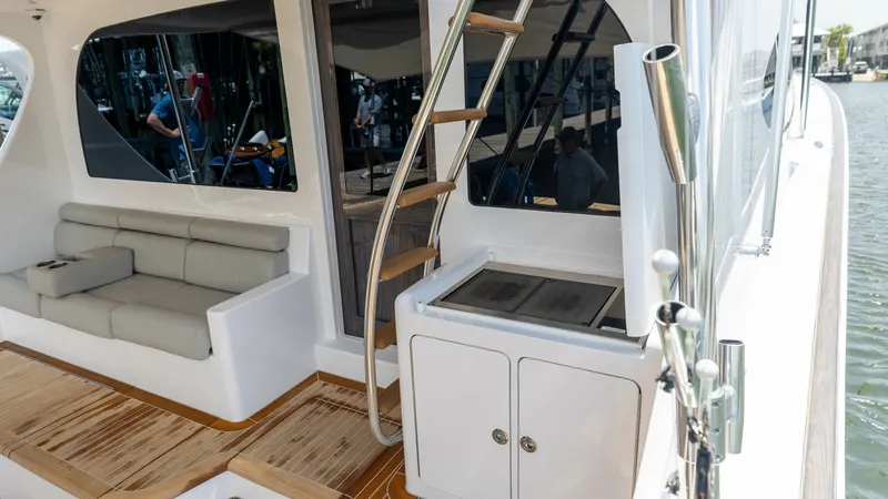 Slide: The Image of 2021 65 Hatteras GT On the DL Cockpit Grill (3) - 7403472