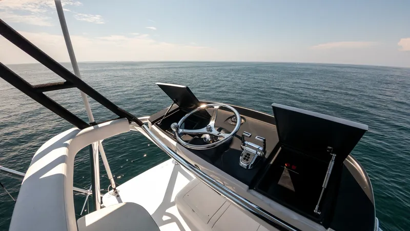 Slide: The Image of 2021 65 Hatteras GT On the DL Tower Helm (1) - 7403416