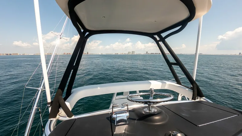 Slide: The Image of 2021 65 Hatteras GT On the DL Tower Helm (3) - 7403490