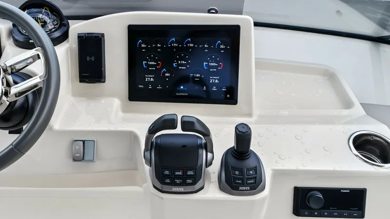 Slide: The Image of Helm Station with Electronics The helm station of the 2024 Absolute 52 Navetta features a sleek and modern design, equipped with state-of-the-art electronics for navigation and control. The central display provides comprehensive readouts, while the ergonomic layout ensures ease of acc - 6851776