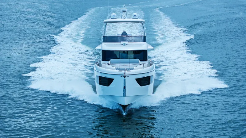 Slide: The Image of Dynamic Bow View in Motion Experience the sleek design and powerful presence of the 2024 Absolute 52 Navetta as it cuts through the water. The bow view showcases the yacht's modern lines and robust construction, emphasizing its stability and elegance. Perfect for those seeking adve - 6851867