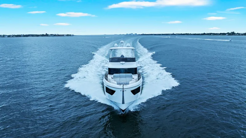 Slide: The Image of Dynamic Bow View Underway The Absolute 52 Navetta 'One More' slices through the water with impressive grace, showcasing its sleek bow design. The yacht's modern lines and expansive windows highlight its luxurious yet functional design. Perfectly balanced, this vessel offers both p - 6851860