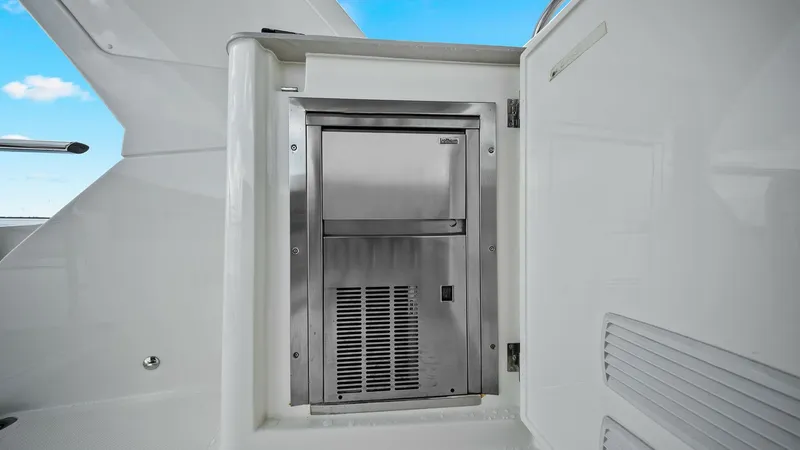 Slide: The Image of Galley Stainless Steel Appliance This image showcases a sleek stainless steel appliance, perfectly integrated into the galley area of the Absolute 52 Navetta. The modern design complements the yacht's luxurious finishes, offering both functionality and style. Its strategic placement maxi - 6851784