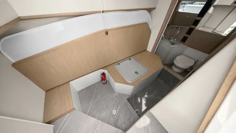 Slide: The Image of Elegant Bathroom with Modern Fixtures This beautifully designed bathroom on the Absolute 52 Navetta features sleek, contemporary fixtures and a spacious layout. The light wood finishes and modern sink basin create an inviting and luxurious atmosphere. Ample storage and a well-positioned windo - 6851835