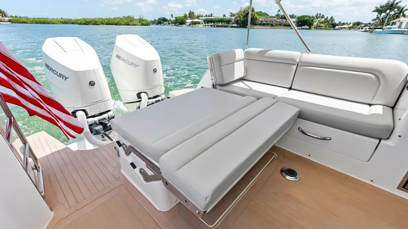 Slide: The Image of Aft Deck Lounge Area with Seating The aft deck of the 2025 MJM M3 features a spacious lounge area with plush, convertible seating, perfect for relaxation and enjoying the view. The high-quality, durable materials and sleek design offer both comfort and style, complemented by the seamless - 6834929